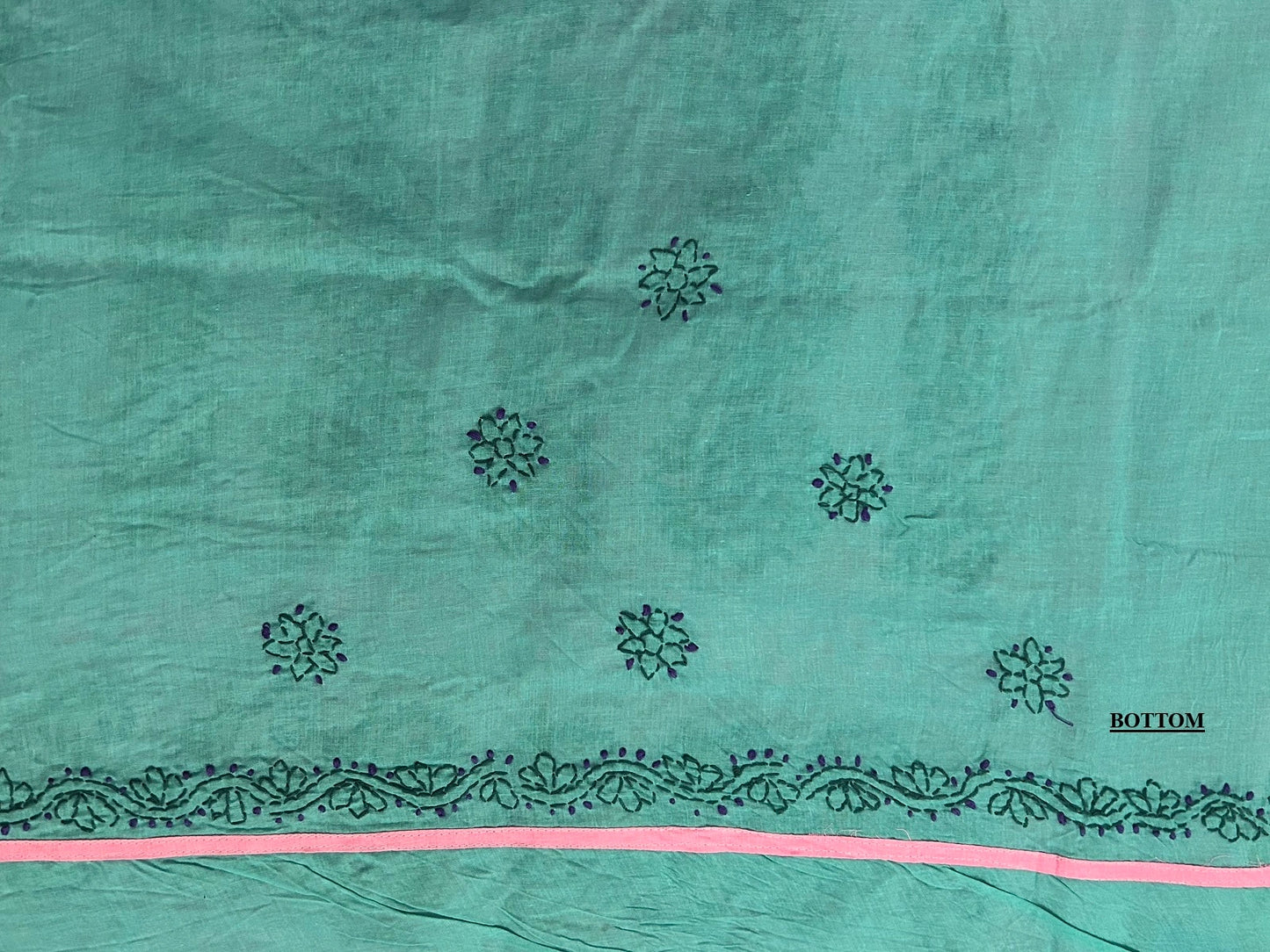 Lucknowi chikankari Teal fabric with black floral patterns and a pink border