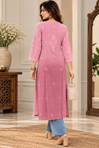 Woman wearing a lucknowi chikankari pink-colored kurta