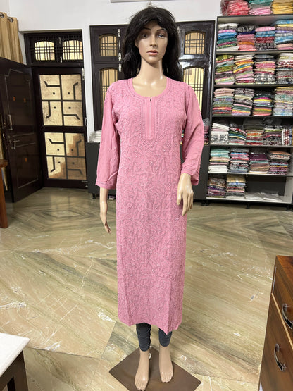 Mannequin wearing a lucknowi chikankari pink-colored kurta