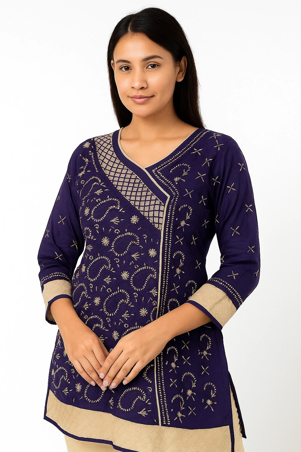 Woman wearing a lucknowi chikankari purple and beige traditional outfit with intricate patterns on a white background