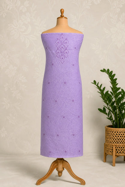lucknowi chikankari Purple dress with pattern on a mannequin against a beige background