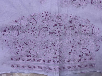 Embroidered fabric with purple floral patterns on a light purple background