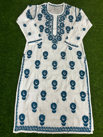 lucknowi chikankari White dress with blue floral patterns on a green background