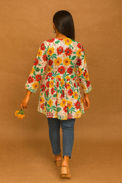 lucknowi chikankari Woman wearing a floral kimono-style jacket against a brown background