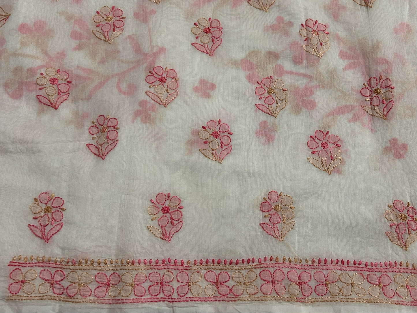lucknowi chikankari Floral patterned fabric with pink and red flowers on a white background