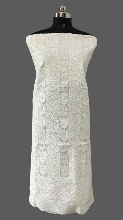 lucknowi chikankari White textured dress on a mannequin against a gray background