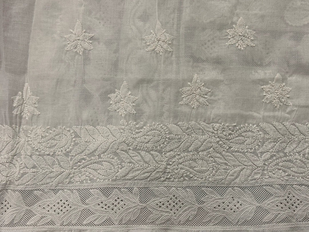 Light gray fabric with floral embroidery and lace details