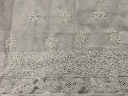 Light gray fabric with floral embroidery and lace details