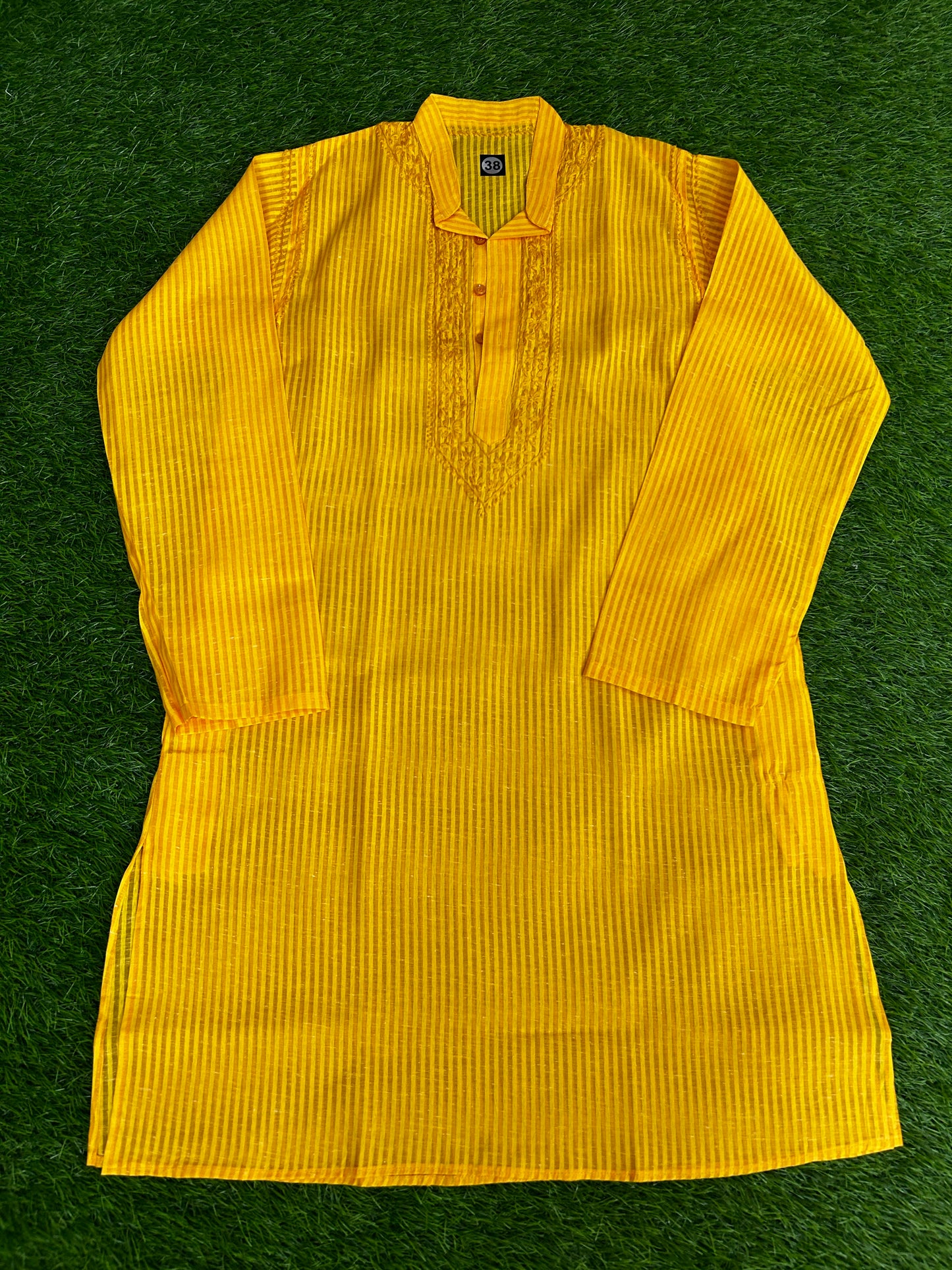 lucknowi chikankari Yellow ribbed long-sleeve shirt on a green textured background